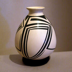 Geometric design on a black on cream vase