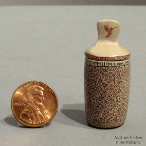 Hummingbird and geometric design on a miniature lidded jar