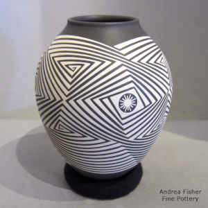 Geometric design in white on a brown jar