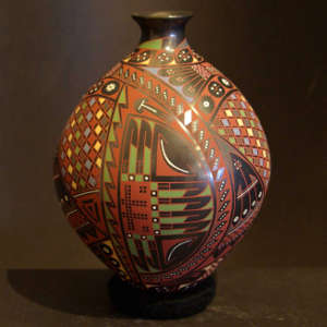 Geometric designs painted on a graphite black jar