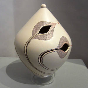 Fine line geometric and hummingbird design on a polychrome lidded jar with organic openings