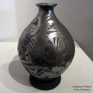 Geometric design on a black on black jar