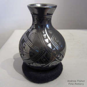 Geometric design on a black on black jar