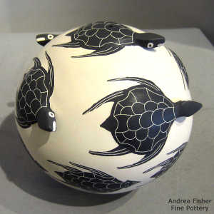 Sgraffito and painted turtle design on a polychrome seed pot