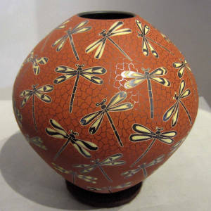 Dragonfly motif on a polychrome jar