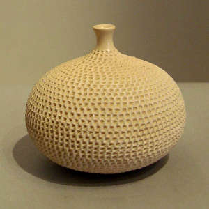 Thin neck corrugated white jar
