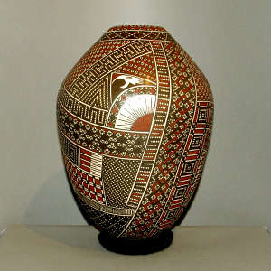 Geometric design totally covers this polychrome jar