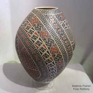 Geometric design covers the entire surface of this polychrome jar