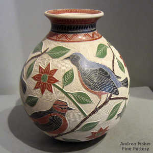 Sgraffito and painted bird, branch and geometric design on a polychrome jar