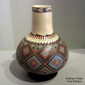 Geometric design on a polychrome tall neck vase