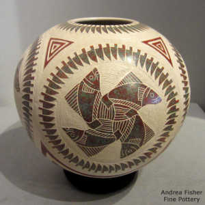Sgraffito and painted medallion, fish, feather and geometric design on a polychrome jar