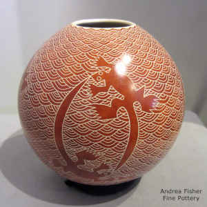 Red and white jar with sgraffito lizard and mesh design