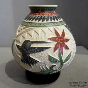 Sgraffito and painted flower, serpent, hummingbird and geometric design on a polychrome jar