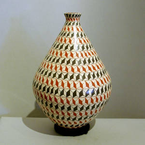 Bans of geometric design on a polychrome vase