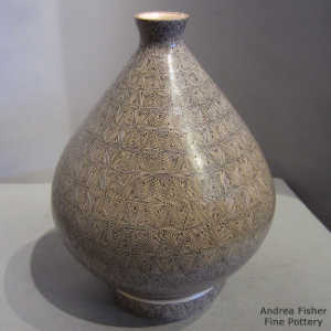 Bands of geometric design on a polychrome jar