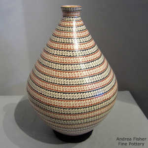 Bands of geometric design on a polychrome jar
