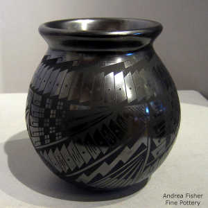 Geometric design on a black on black jar