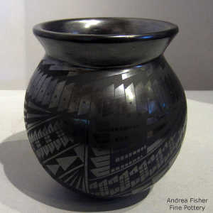 Geometric design on a black on black jar