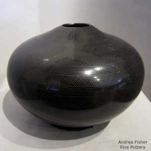 Geometric design on a black on black jar