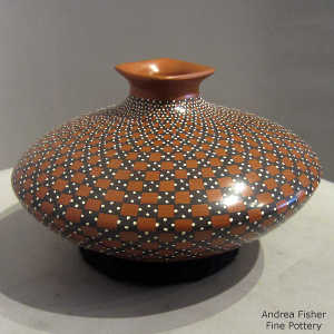 C geometric design on a polychrome jar