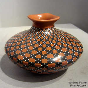 Cuadrillos geometric design on a polychrome jar with a square rim