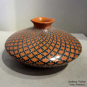 Cuadrillos geometric design on a polychrome jar
