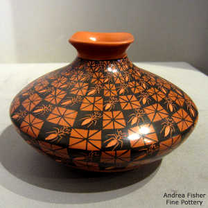 Sgraffito ants and painted cuadrillos geometric design on a polychrome jar
