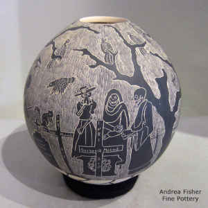 Sgraffito Night of the Dead motif on a black and white jar