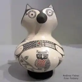 Sgraffito and painted owl, branch and geometric design on a polychrome owl effigy