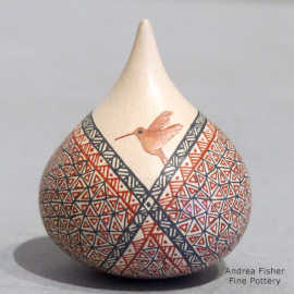 Miniature polychrome tear drop jar with a hummingbird and geometric design