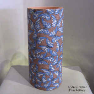 Click to see a larger version Sgraffito and painted butterfly and fine line geometric design on a polychrome cylinder