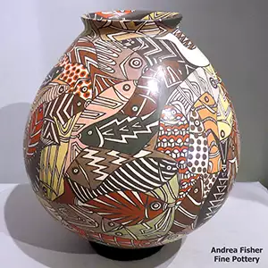 Polychrome jar with a fish and geometric design