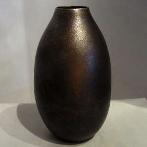 Black micaceous cylinder