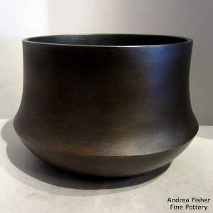 Fire clouds on a black micaceous jar