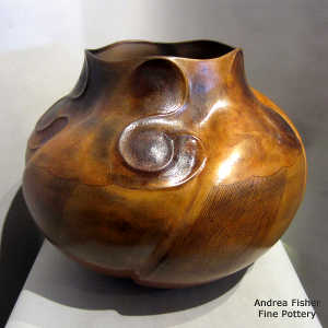 Fire clouds and an organic opening on a brown on brown shaped and formed jar