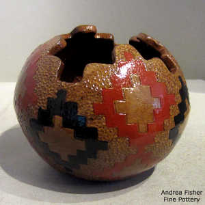 Kiva step opening and Navajo rug design on a polychrome jar