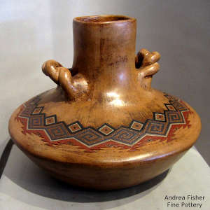 Navajo rug design, braided handles and pine pitch coating on a square neck brown jar