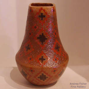 A Navajo rug design and pine pitch coating on a tall neck brown jar