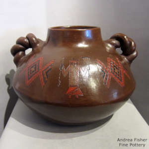 Navajo rug pattern and Yei design plus twisted handles and pine pitch finish on a polychrome jar