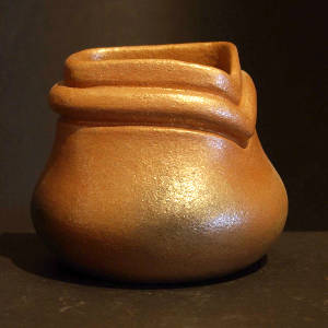 Micaceous jar with a double mouth