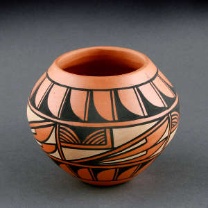 A polychrome jar with bird elements and a geometric design