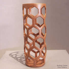 Holey golden micaceous cylinder
