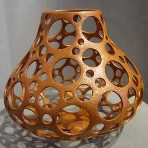 A micaceous gourd-shaped perforated jar
