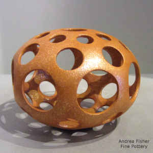 Holey golden micaceous seed pot