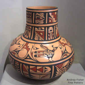 Bird, cloud, shard and geometric design on a polychrome jar