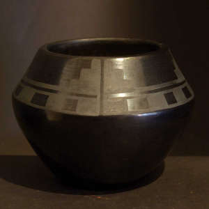 Kiva step and geometric design on a black on black jar