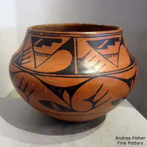 Geometric design on a black on red jar