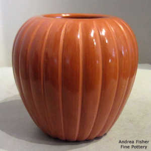 Red melon jar with carved ribs