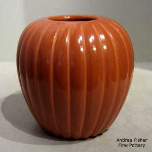 Red jar carved with a melon design