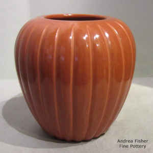 Carved red melon jar